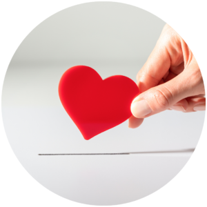 photo of a hand holding a heart