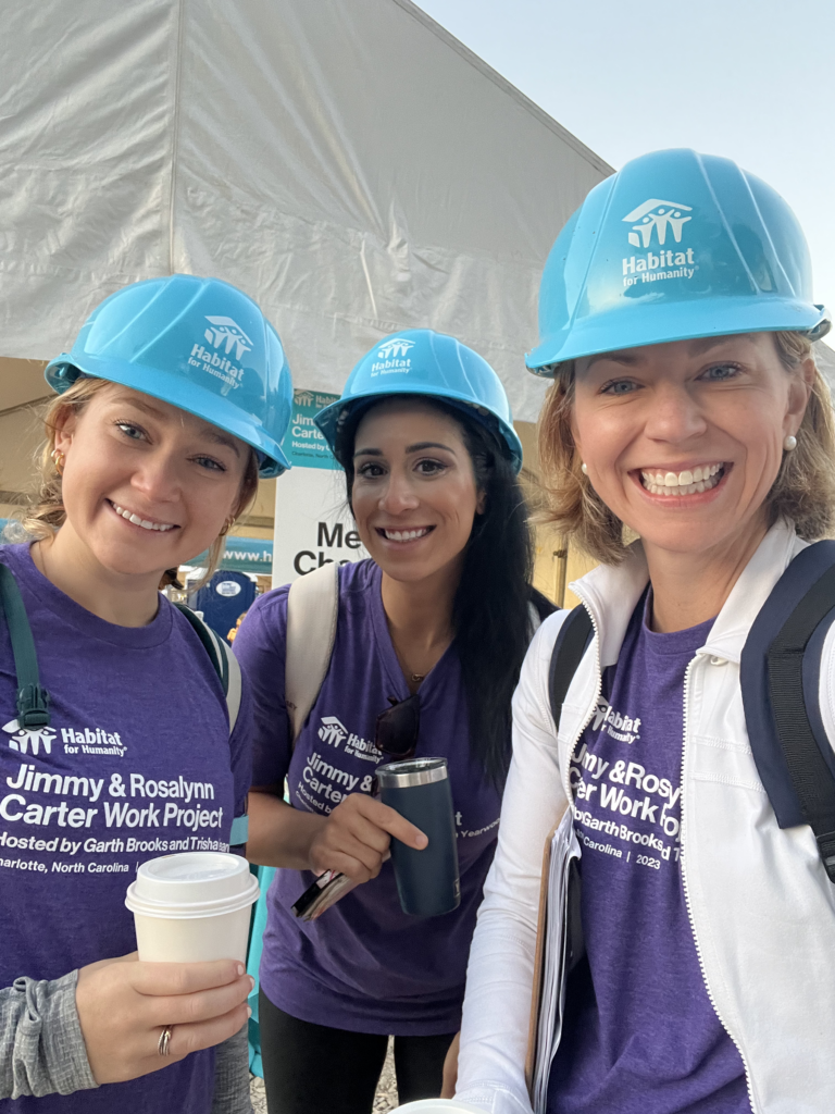photo of Ascent Strategic Communications team wearing hard hats