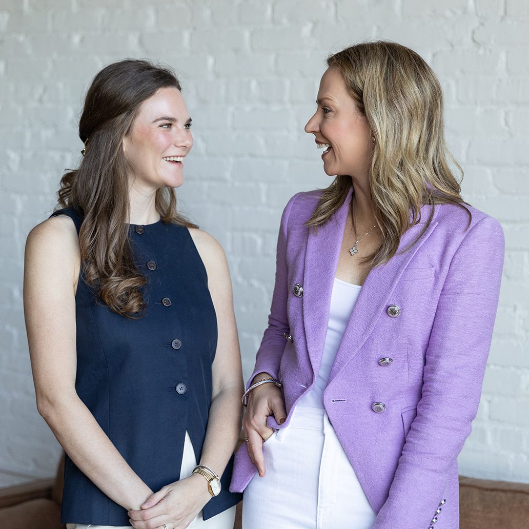 photo of Ascent Strategic Communications team members looking at each other